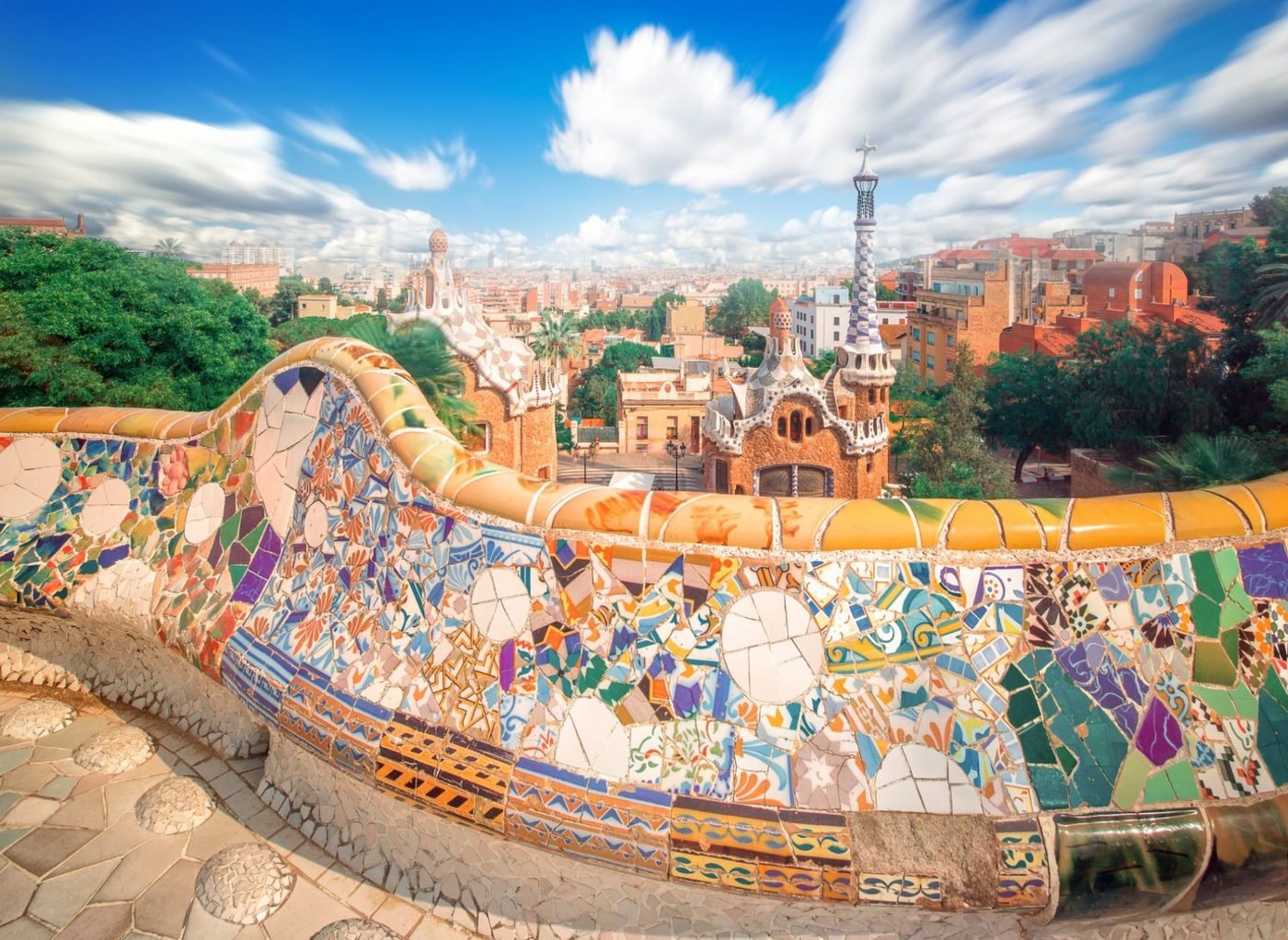 The mosaic terrace of Park Güell overlooking Barcelona
